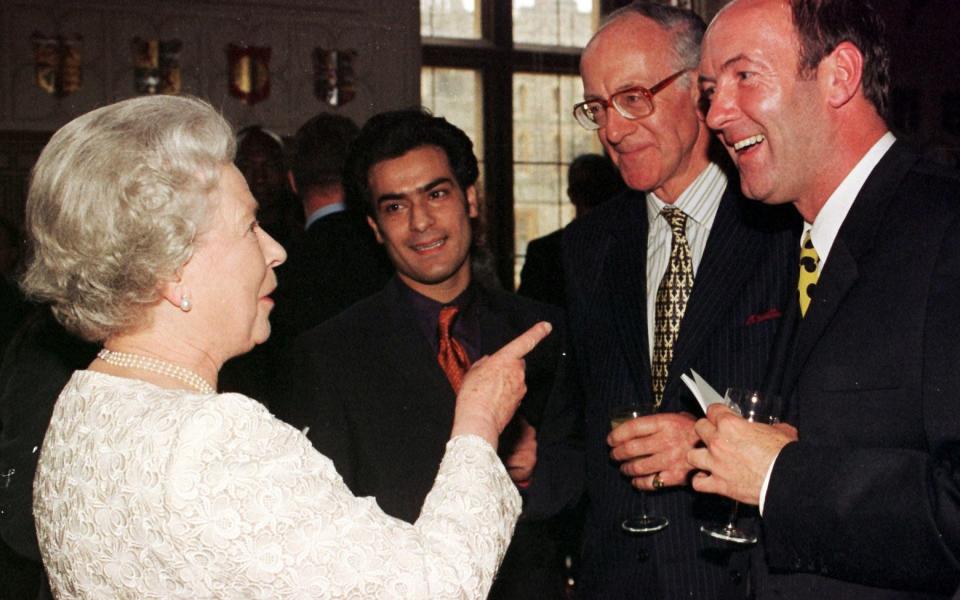 Sullivan with Queen Elizabeth II, who recognised him instantly