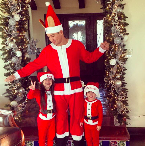 <p>Mario Lopez really got into the Christmas spirit with his kids, Gia, 6, and Dominic, 3, on Christmas morning. The <i>Extra</i> host’s wife Courtney dubbed the adorable trio “Santa squad…” (Photo: <a rel="nofollow noopener" href="https://www.instagram.com/p/BOcvYq2A11g/" target="_blank" data-ylk="slk:Instagram;elm:context_link;itc:0" class="link ">Instagram</a>) </p>