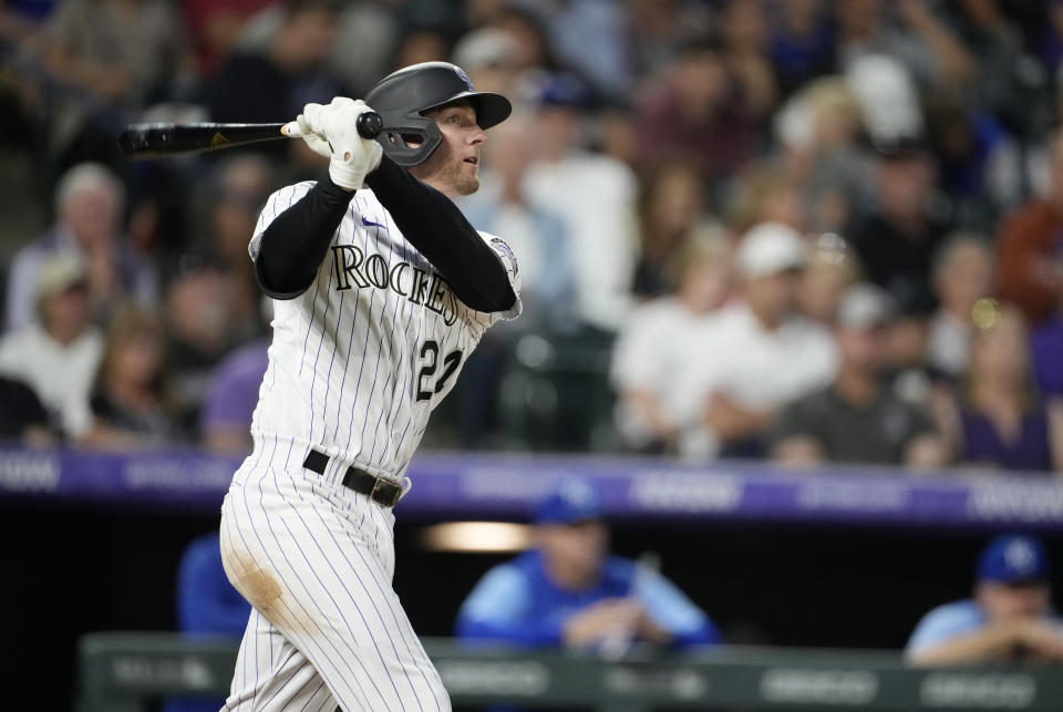 Colorado Rockies' Ryan McMahon watches his solo home run off Kansas City Royals relief pitcher Ronald Bolanos during the seventh inning of a baseball game Saturday, May 14, 2022, in Denver. (AP Photo/David Zalubowski)