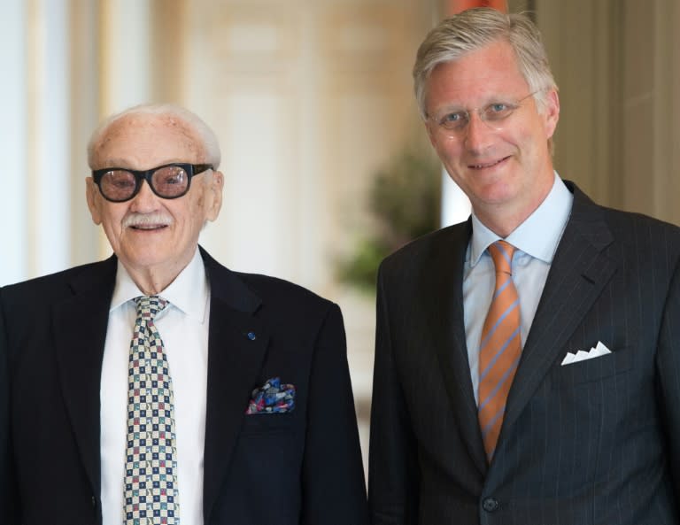 "Toots" Thielemans (L) is pictured with King Philippe of Belgium at the Castle in Laeken-Laken, Brussels in 2014