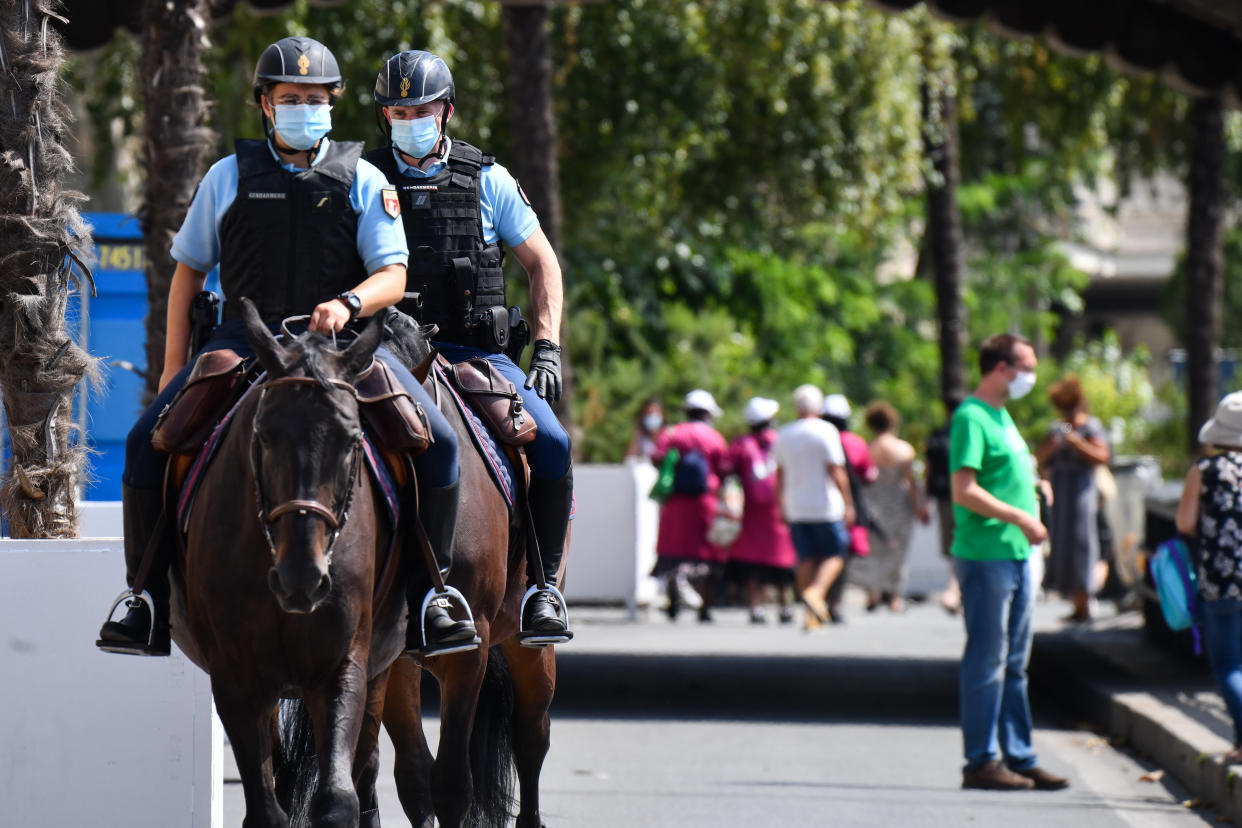 PARIS, FRANCE - AUGUST 13: Police officers patrol in touristic and frequented areas of Paris as government takes new measures against coronavirus (Covid-19) forcing the wearing of mask in certain streets frequented in order to combat the pandemic in Paris, France on August 13, 2020. (Photo by Julien Mattia/Anadolu Agency via Getty Images)