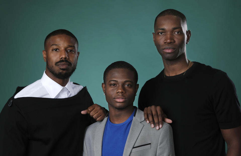 Tarell Alvin McCraney, right, creator/executive producer of the OWN series "David Makes Man," poses with executive producer Michael B. Jordan, left, and cast member Akili McDowell for a portrait during the 2019 Television Critics Association Summer Press Tour at the Beverly Hilton, Friday, July 26, 2019, in Beverly Hills, Calif. (Photo by Chris Pizzello/Invision/AP)