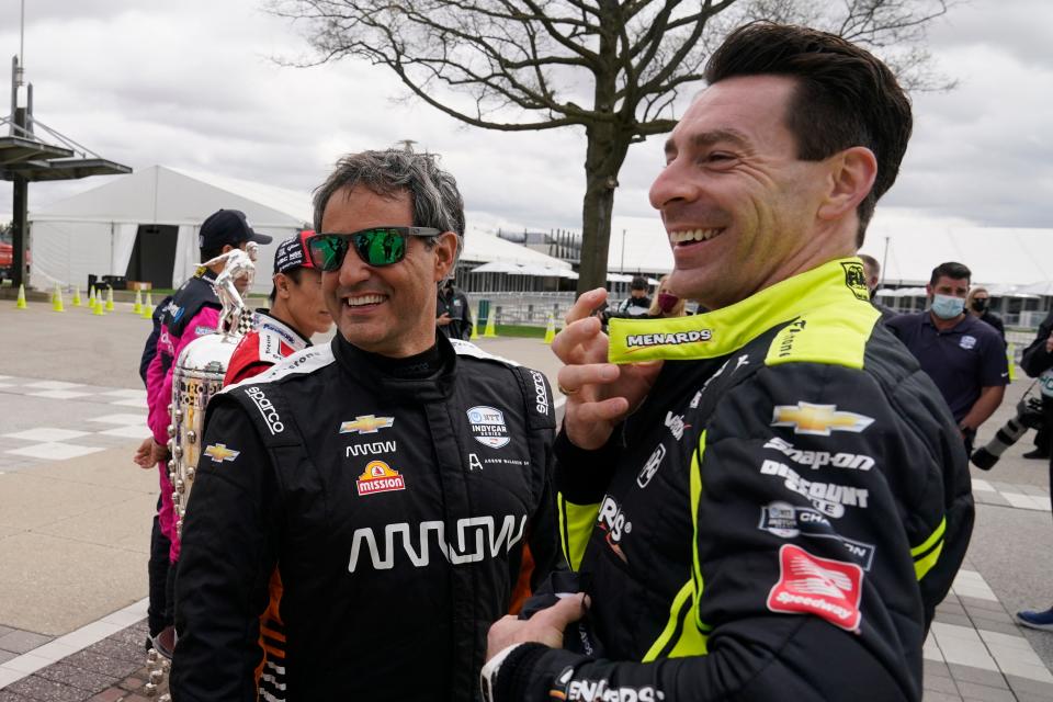 Will Simon Pagenaud, right, follow the same career path as Juan Pablo Montoya, left? Only Roger Penske knows.