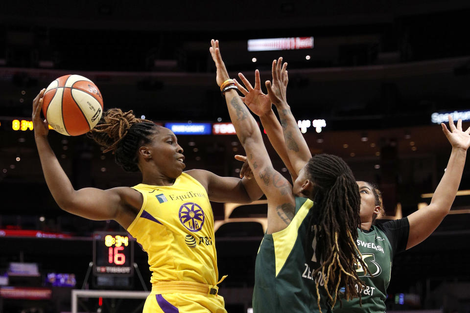 LOS ANGELES, CALIFORNIA - SEPTEMBER 05: Guard Chelsea Gray #12 of the Los Angeles Sparks looks to pass the ball defended by guard Shavonte Zellous #11 of the Seattle Storm at Staples Center on September 05, 2019 in Los Angeles, California. NOTE TO USER: User expressly acknowledges and agrees that, by downloading and or using this photograph, User is consenting to the terms and conditions of the Getty Images License Agreement. (Photo by Meg Oliphant/Getty Images)