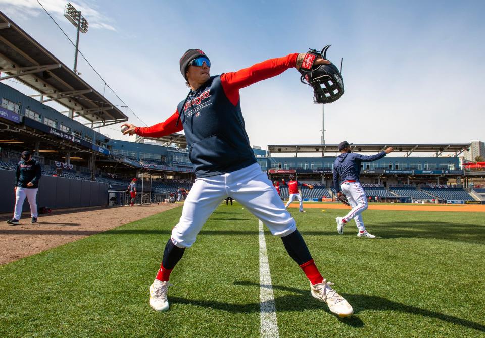 WORCESTER - Jarren Duran and the Worcester Red Sox warm up on the field at Polar Park before their season opener Friday, March 31, 2023. 