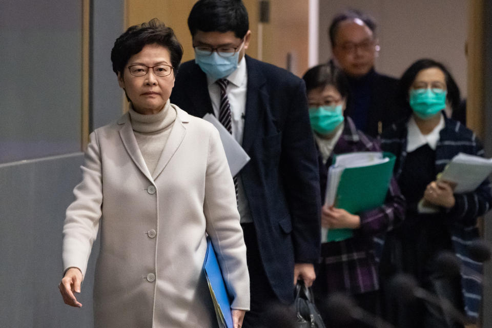 HONG KONG, CHINA - FEBRUARY 03: Hong Kong chief executive Carrie Lam arrives at a press conference at the Central Government Complex on February 3, 2020 in Hong Kong, China. Government announced they will shutdown all but two of the border crossing stations with mainland China. Hong Kong has 15 confirmed cases of Novel coronavirus (2019-nCoV), with over 17000 confirmed cases around the world, the virus has so far claimed over 300 lives.(Photo by Anthony Kwan/Getty Images)