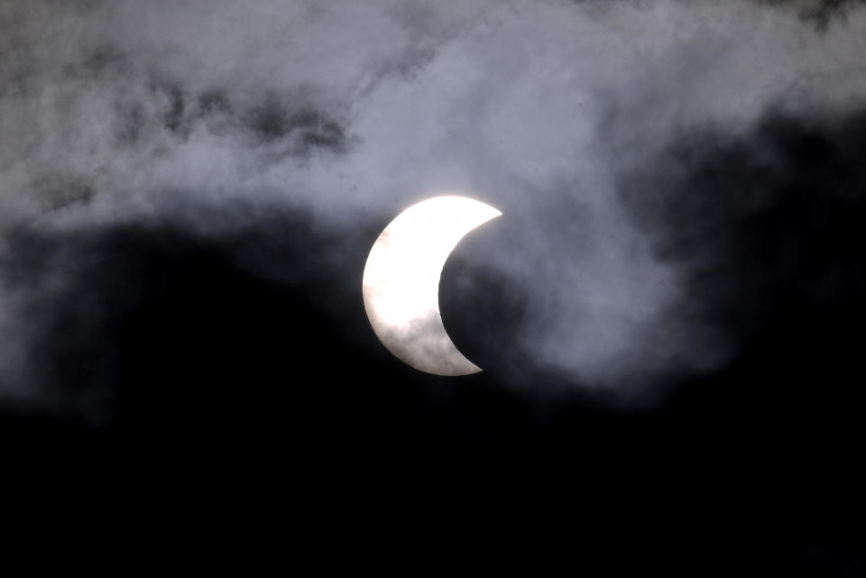 The moon crosses in front of the sun during the annular solar eclipse at Mineirao Stadium, in Belo Horizonte, state of Minas Gerais, Brasil, on October 14, 2023. Skygazers across the Americas turned their faces upwards Saturday for a rare celestial event: an annular solar eclipse. (Photo by DOUGLAS MAGNO / Douglas Magno / AFP) (Photo by DOUGLAS MAGNO/Douglas Magno/AFP via Getty Images)