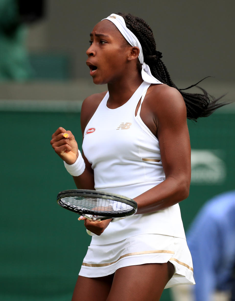 Cori Gauff reacts during her match against Venus Williams on day one of the Wimbledon Championships at the All England Lawn Tennis and Croquet Club, Wimbledon.