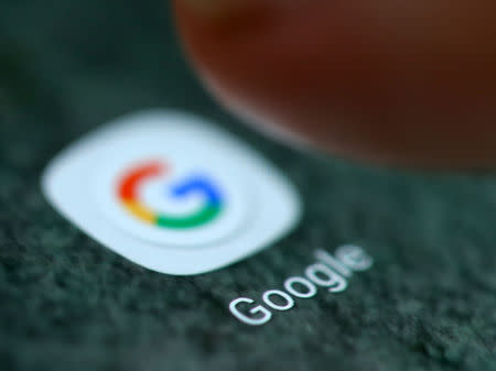 The Google app logo is seen on a smartphone in this picture illustration taken September 15, 2017. REUTERS/Dado Ruvic/Illustration/File Photo