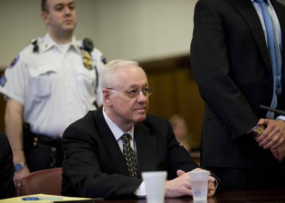 FILE - Former New York State Comptroller Alan Hevesi awaits sentencing in Manhattan State Supreme Court, April 15, 2011, in New York. Hevesi, a longtime elected official from New York City who resigned as state comptroller amid one scandal and later served prison time for another involving influence-peddling, died Thursday, Nov. 9, 2023. He was 83. (AP Photo/Stephen Chernin, File)