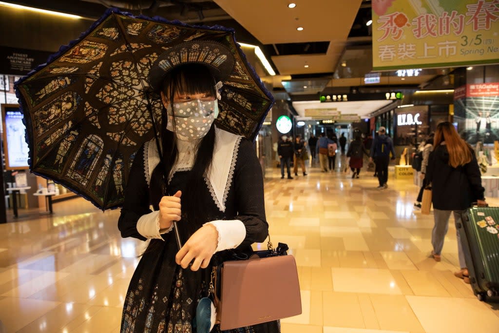 <p>A Taiwanese shopper browsing a mall in Taipei during the pandemic</p> (Getty Images)