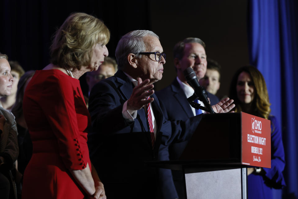 Republican Ohio Gov. Mike DeWine, second from left, speaks during an election night watch party Tuesday, Nov. 8, 2022, in Columbus, Ohio. (AP Photo/Jay LaPrete)