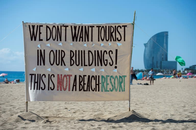 No escape: In Barcelona, protesters have hit the beaches to make their message heard