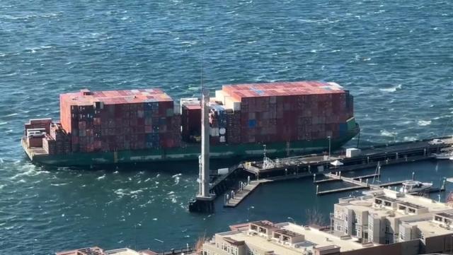 Large 'runaway barge' breaks away from terminal and crashes into