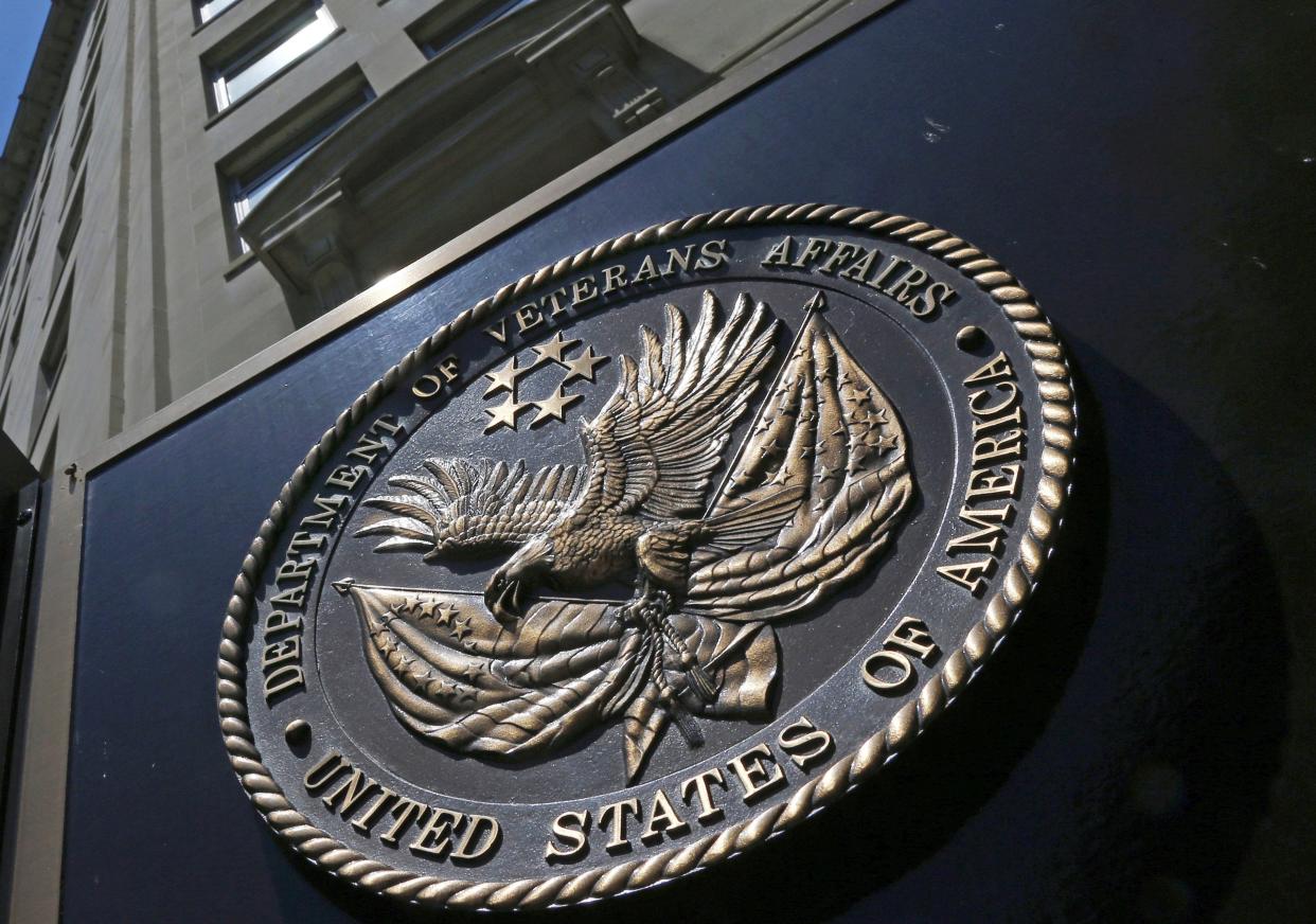 A seal is displayed on the front of the Veterans Affairs Department building in Washington, D.C.