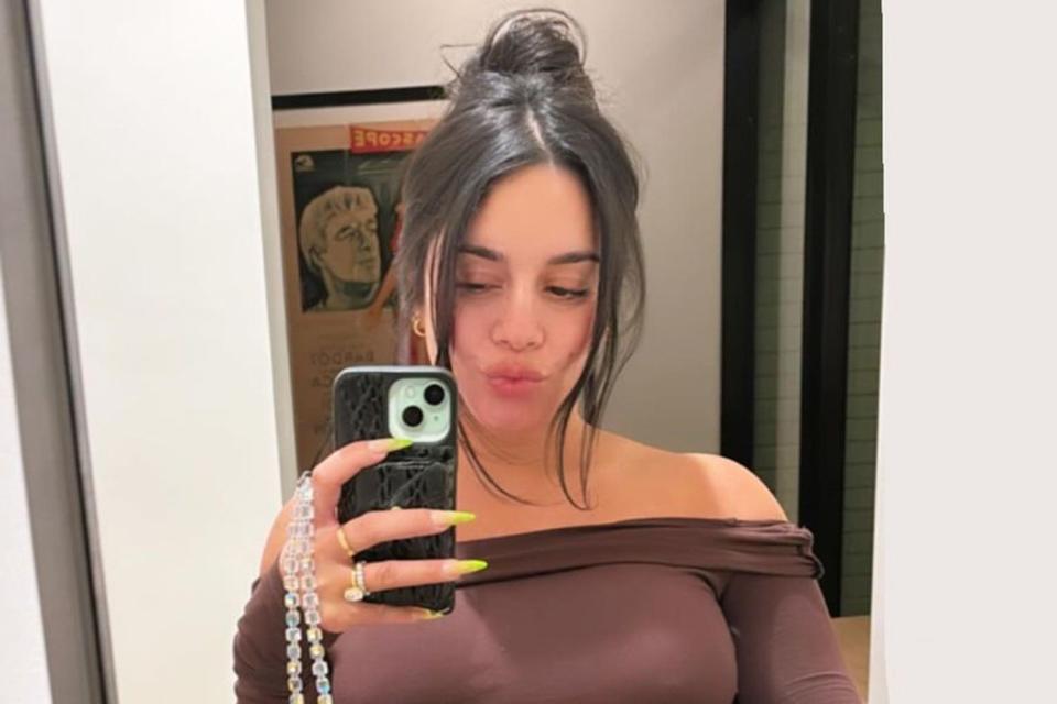 <p>Vanessa Hudgens/Instagram</p> Pregnant Vanessa Hudgens shares selfie of herself in chic brown dress