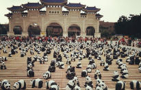 In March, the pandas visit the main gate at the Chiang Kai-shek Memorial Hall in Taipei, Taiwan.