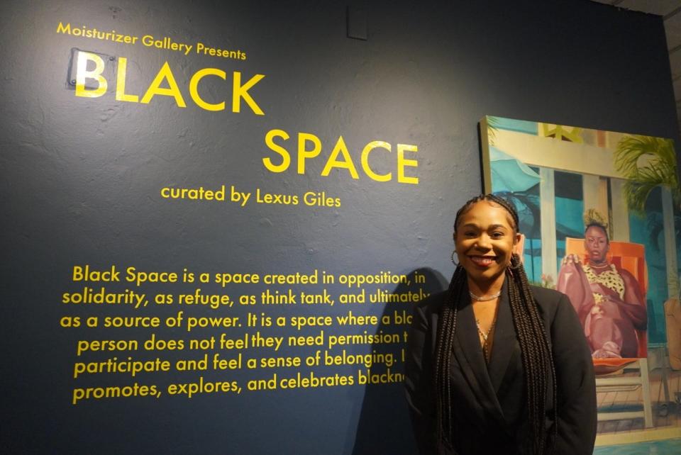 Lexus Giles, a University of Florida graduate student, is the curator of the Black Space Art Exhibition at the Thomas Center in Gainesville.