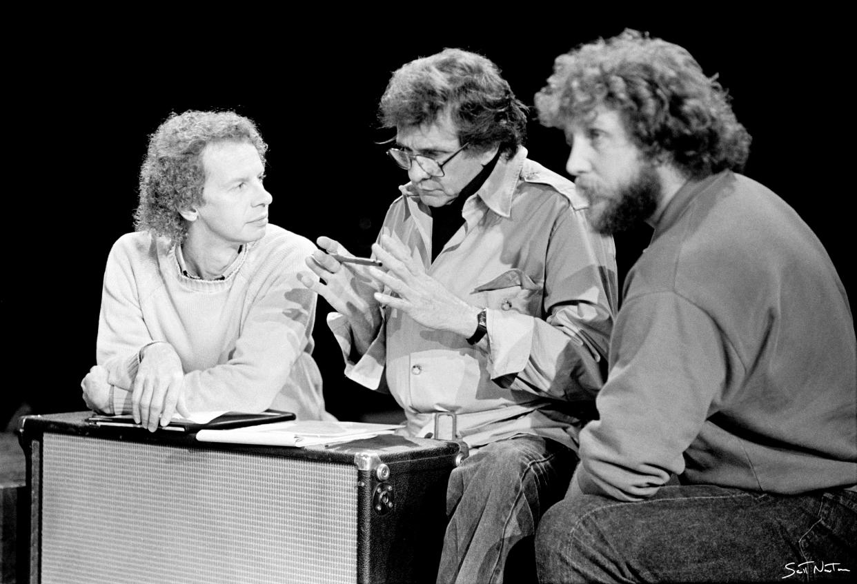 Executive producer Terry Lickona, left, Johnny Cash and show director Gary Menotti discuss Cash's set before his "ACL" taping in 1987. The country music icon was "nervous about doing an important show that was 'all about the music,'" Lickona said.
