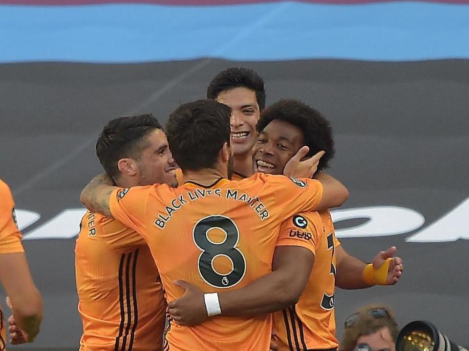 Traore celebrates with his Wolves teammates: Getty