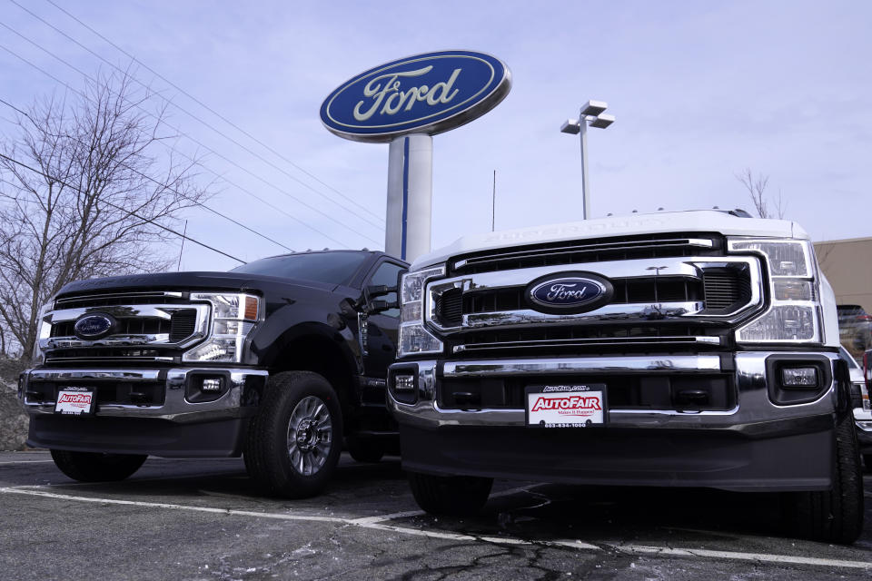 Ford pick-up trucks are displayed at a dealership, Monday, Feb. 6, 2023, in Manchester, N.H. On Thursday, the Commerce Department issues its third and final estimate of how the U.S. economy performed in the fourth quarter of 2022.(AP Photo/Charles Krupa)