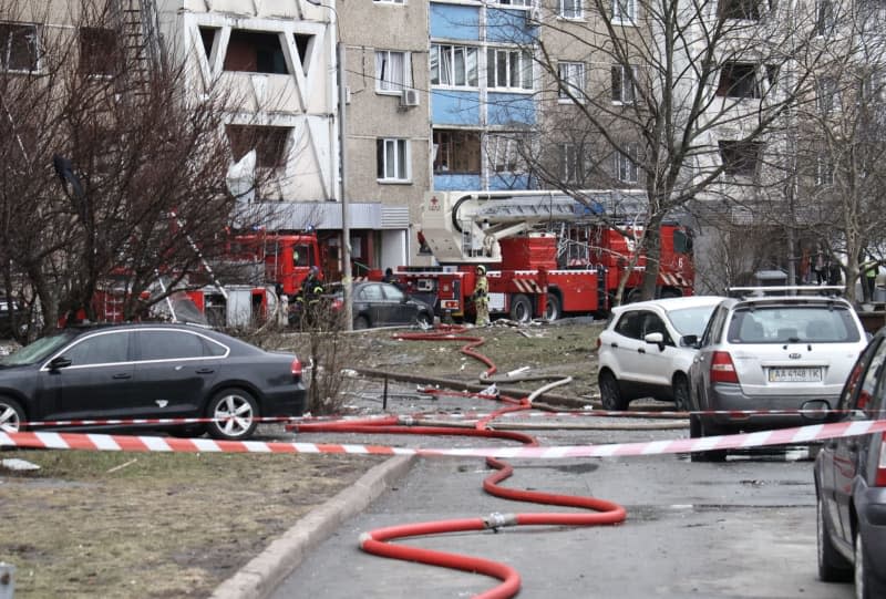 Firefighters put out a fire in a block of flats in the Holosiivskyi district following a Russian missile attack. -/https://photonew.ukrinform.com/ Ukrinform/dpa