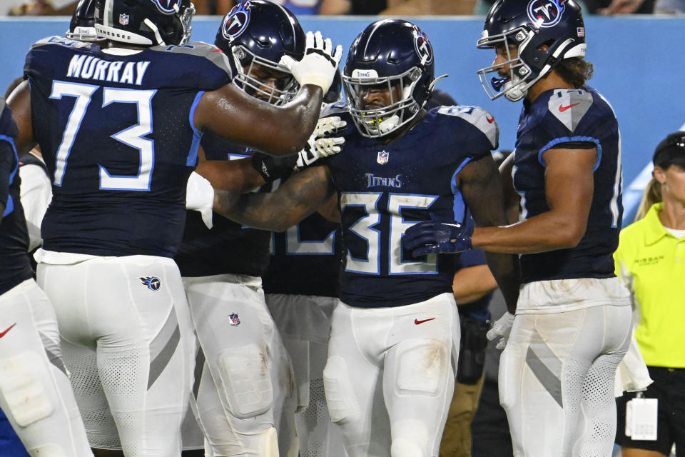 Tennessee Titans running back Julius Chestnut (36) is congratulated on his touchdown in the first half of an NFL preseason football game against the New England Patriots Friday, Aug. 25, 2023, in Nashville, Tenn. (AP Photo/John Amis)