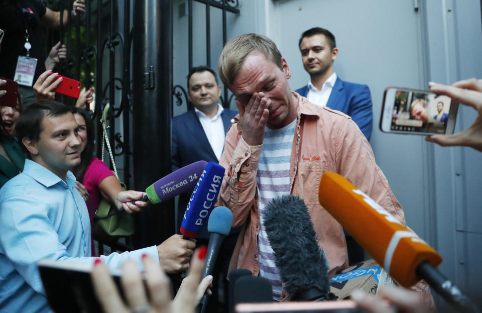 Prominent Russian investigative journalist Ivan Golunov, cries as he leaves a Investigative Committee building in Moscow, Russia, Tuesday, June 11, 2019. In a surprising turnaround, Russia's police chief on Tuesday dropped all charges against a prominent investigative reporter whose detention sparked public outrage and promised to go after the police officers who tried to frame the journalist as a drug-dealer. (AP Photo/Pavel Golovkin)