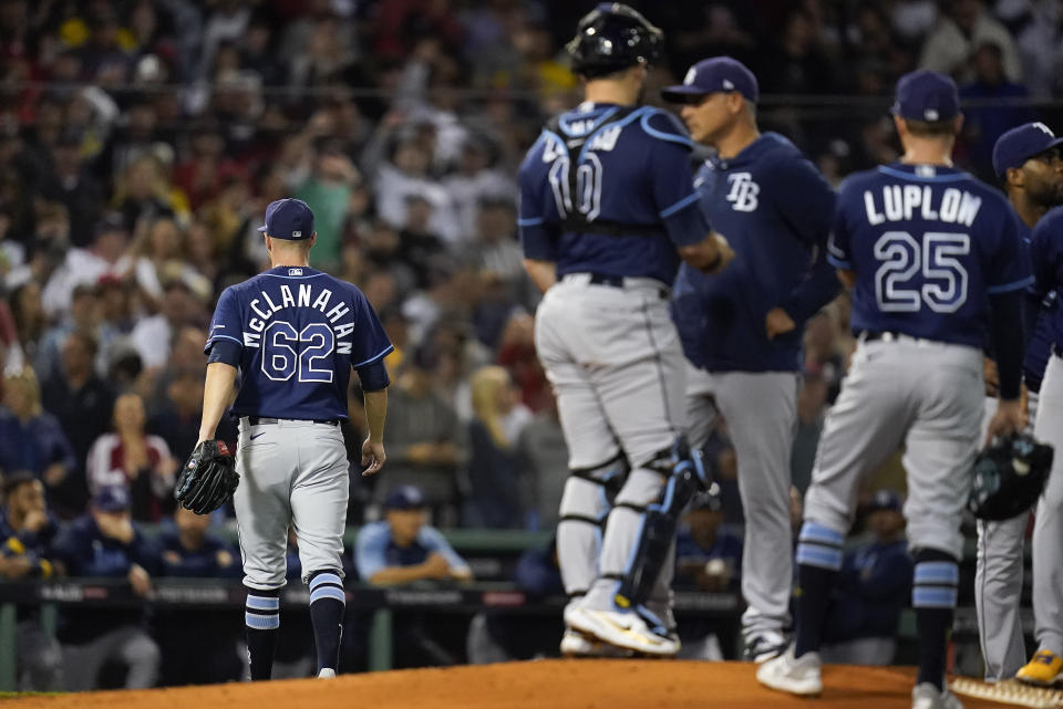 Tampa Bay Rays pitcher Shane McClanahan (62) walks off the field during the third inning against the Boston Red Sox during Game 4 of a baseball American League Division Series, Monday, Oct. 11, 2021, in Boston. (AP Photo/Charles Krupa)