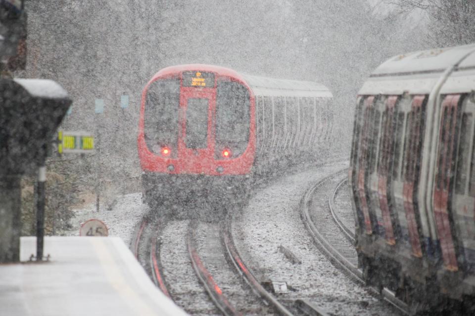 A District line train during a flurry of snow in London earlier this month: PA Wire/PA Images