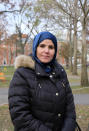 Samia Omar, a chaplain at Harvard University, poses for a portrait at Harvard Yard in Cambridge, Mass., Nov. 30, 2021. Omar and her husband, Imam Khalil Abdur-Rashid, who co-founded The Islamic Seminary of America together and now serve as Harvard’s Muslim chaplains, offer programming and mentoring for Muslim students on campus. (Aysha Khan/Religion News Service via AP)