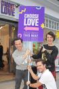 Andrew Scott, Phoebe Waller-Bridge and Ben Aldridge volunteer during March Fund Day at the Choose Love shop for the Help Refugees organization on Thursday in London. 