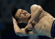 Ken Terauchi of Japan competes in men's diving 3m springboard final at the Tokyo Aquatics Centre at the 2020 Summer Olympics, Tuesday, Aug. 3, 2021, in Tokyo, Japan. (AP Photo/Dmitri Lovetsky)