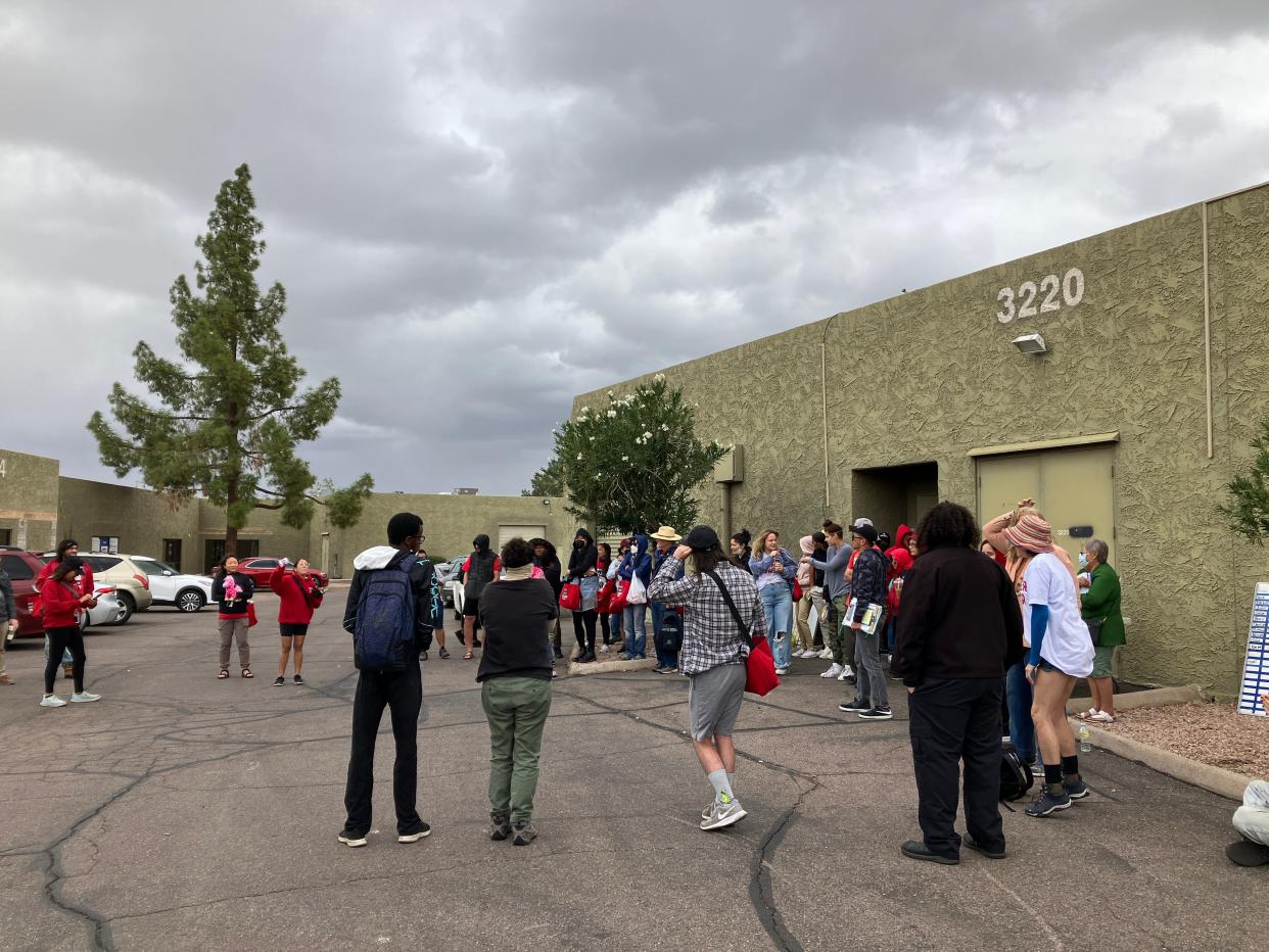 Unite Here canvassers get ready to go out door knocking in a Tempe parking lot on the morning of Nov. 3, 2022.