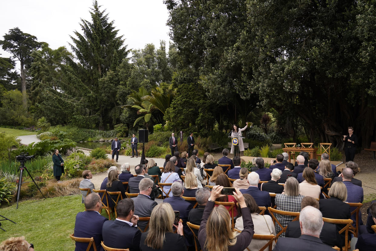 New Zealand Prime Minister Jacinda Ardern gestures while speaking at the San Francisco Botanical Garden in San Francisco, Friday, May 27, 2022. Newsom met with Ardern in Golden Gate Park "to establish a new international partnership tackling climate change." (AP Photo/Eric Risberg)