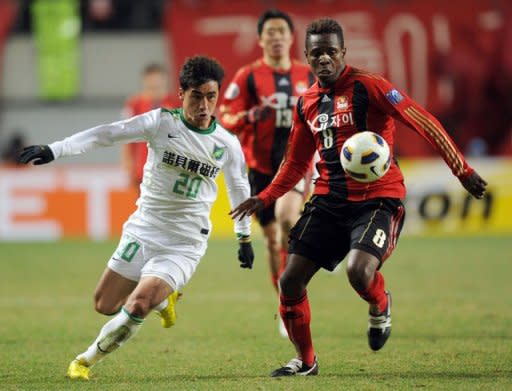 South Korea's FC Seoul striker Dejan Damjanovic celebrates after