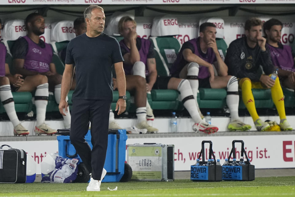 Germany head coach Hansi Flick observes during an international friendly soccer match between Germany and Japan in Wolfsburg, Germany, Saturday, Sept. 9, 2023. (AP Photo/Martin Meissner)