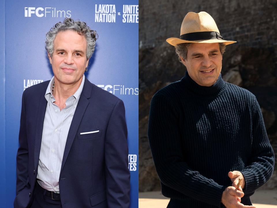 left: mark ruffalo smiling on a red carpet, wearing a casual blue shirt and blazer and smiling slightly; right: ruffalo as daniel in all the light we cannot see, wearing a navy turtleneck and hat, rubbing his hands together on the beach