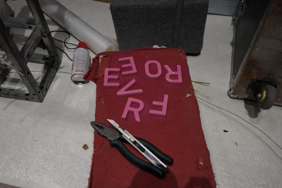 Characters to form the words "Forever" are seen at the venue being setup for a wedding in Beijing on Friday, Dec. 11, 2020. One wedding planner reported 50% decrease in business over the previous year but is optimistic for the future as couples who pushed back their weddings are helping revitalize the industry as the pandemic fades and restrictions are lifted in China. (AP Photo/Ng Han Guan)