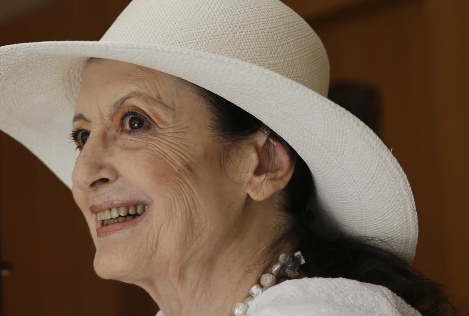 Italian ballet dancer Carla Fracci poses as she attends the presentation of the 'Stradivari Festival' in Milan, Italy, Tuesday, July 4, 2017. Carla Fracci, an Italian cultural icon and former La Scala prima ballerina who formed a memorable partnership with Rudolf Nureyev, has died at her home in Milan. She was 84. The La Scala theater announced her death Thursday with “great sadness,” without giving a cause. (AP Photo/Luca Bruno)