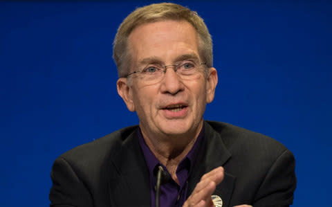 Earl Maize speaks during a press conference held after the end of the Cassini - Credit: NASA