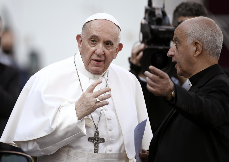 Pope Francis arrives to lead the prayer to mark the end of the month of worldwide prayers to stop the pandemic in the Vatican gardens Monday, May 31, 2021 (Filippo Monteforte/Pool photo via AP)