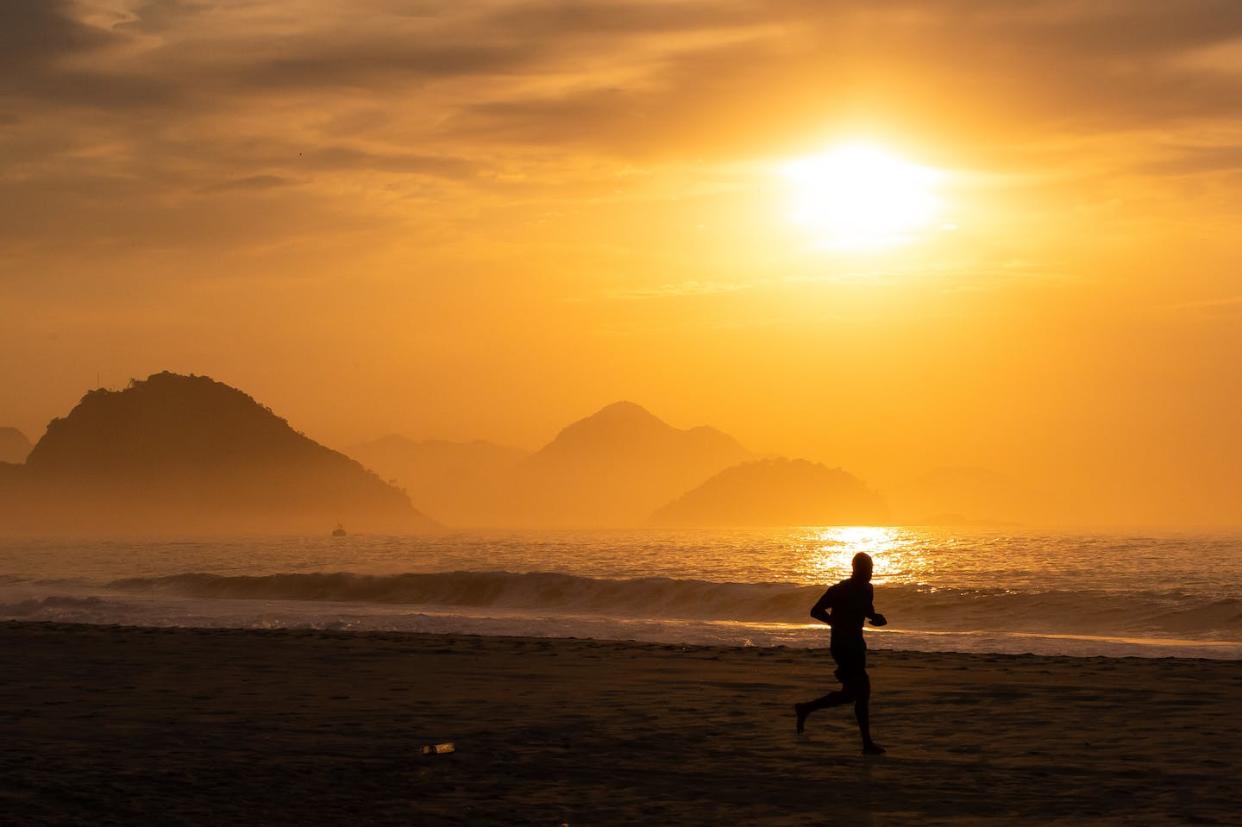 Some areas wouldn't see immediate effects, and there could be serious consequences. <a href="https://www.gettyimages.com/detail/news-photo/man-jogs-by-copacabana-beach-at-sunrise-during-the-news-photo/1211936090" rel="nofollow noopener" target="_blank" data-ylk="slk:Buda Mendes/Getty Images;elm:context_link;itc:0;sec:content-canvas" class="link ">Buda Mendes/Getty Images</a>