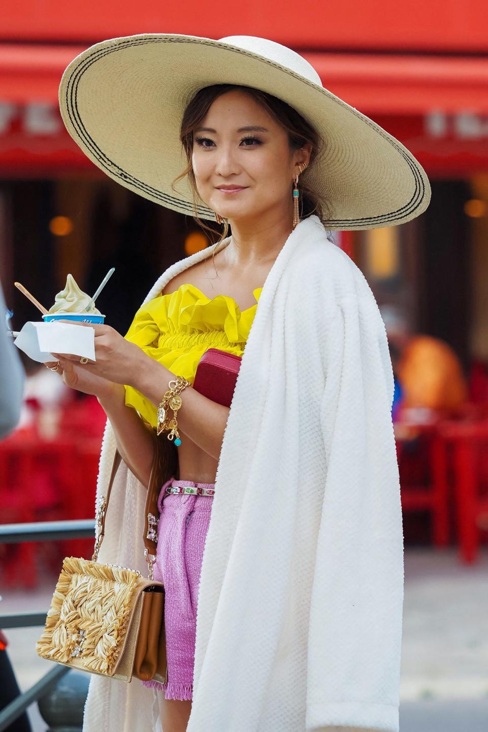 <p>We all scream for ice cream! Ashley Park sported a colorful ensemble while filming in St. Tropez on May 9. </p>