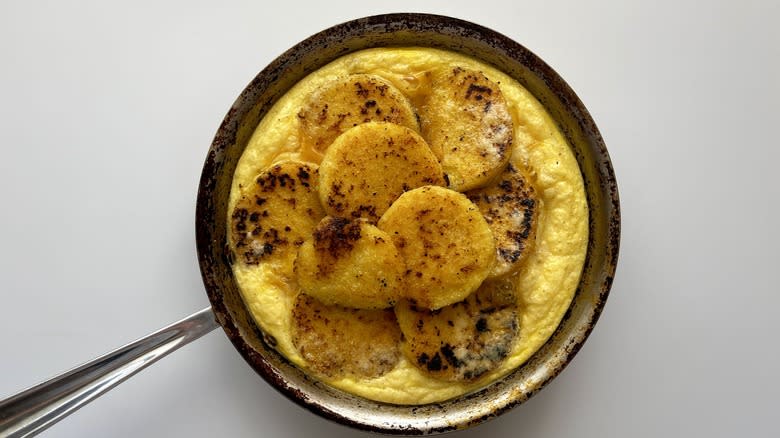 baked fried polenta frittata in a skillet