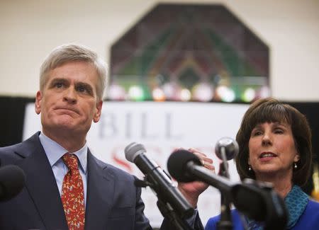 Republican U.S. Representative Bill Cassidy addresses supporters with his wife Laura after winning the run-off election for U.S. Senate against Democrat Mary Landrieu in Baton Rouge, Louisiana, December 6, 2014. REUTERS/Lee Celano