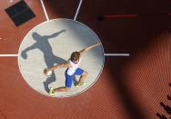 France's Kevin Mayer competes in the men's decathlon discus throw event at the London 2012 Olympic Games at the Olympic Stadium August 9, 2012. REUTERS/Pawel Kopczynski (BRITAIN - Tags: OLYMPICS SPORT ATHLETICS TPX IMAGES OF THE DAY)