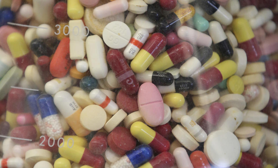 Seized prescription drugs displayed in a glass flask in the controlled substance room of the Utah state crime lab (AP Photo/Rick Bowmer)