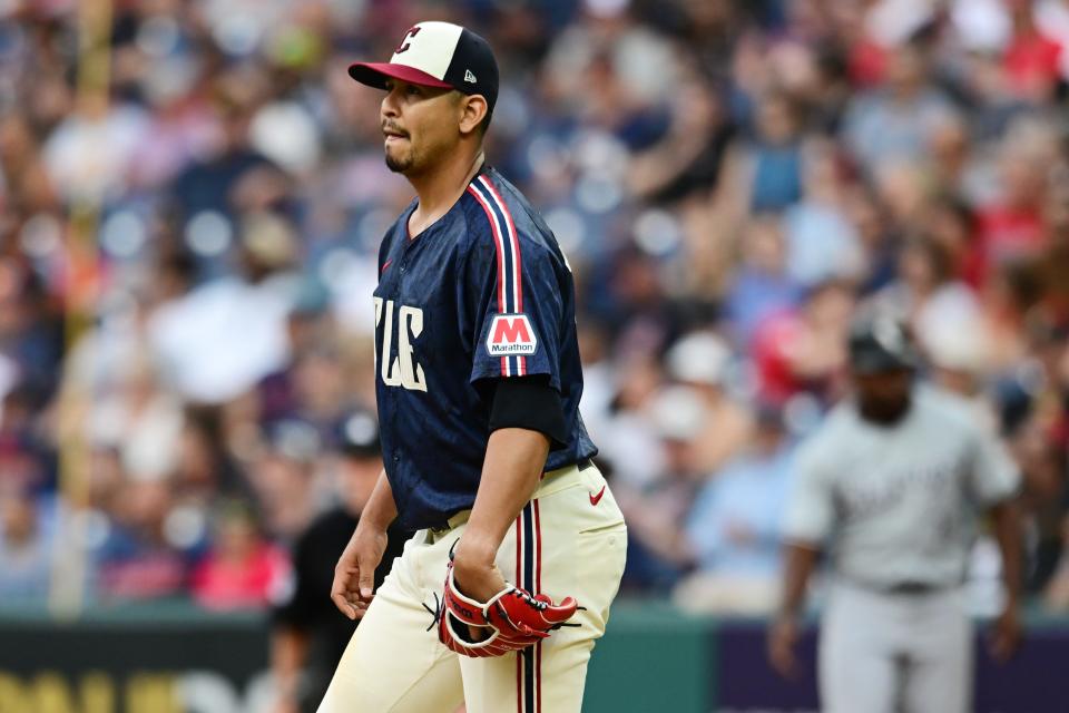 Jul 2, 2024; Cleveland, Ohio, USA; Cleveland Guardians starting pitcher Carlos Carrasco (59) reacts after giving up a two run home run to Chicago White Sox center fielder Luis Robert Jr. (not pictured) during the sixth inning at Progressive Field. Mandatory Credit: Ken Blaze-USA TODAY Sports