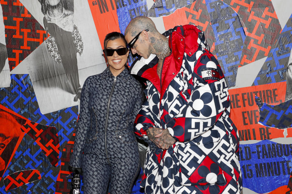 BROOKLYN, NEW YORK - SEPTEMBER 11: Kourtney Kardashian and Travis Barker attend Tommy Factory New York Fall 2022 at Skyline Drive-In on September 11, 2022 in Brooklyn, New York. (Photo by Astrid Stawiarz/Getty Images for Tommy Hilfiger)